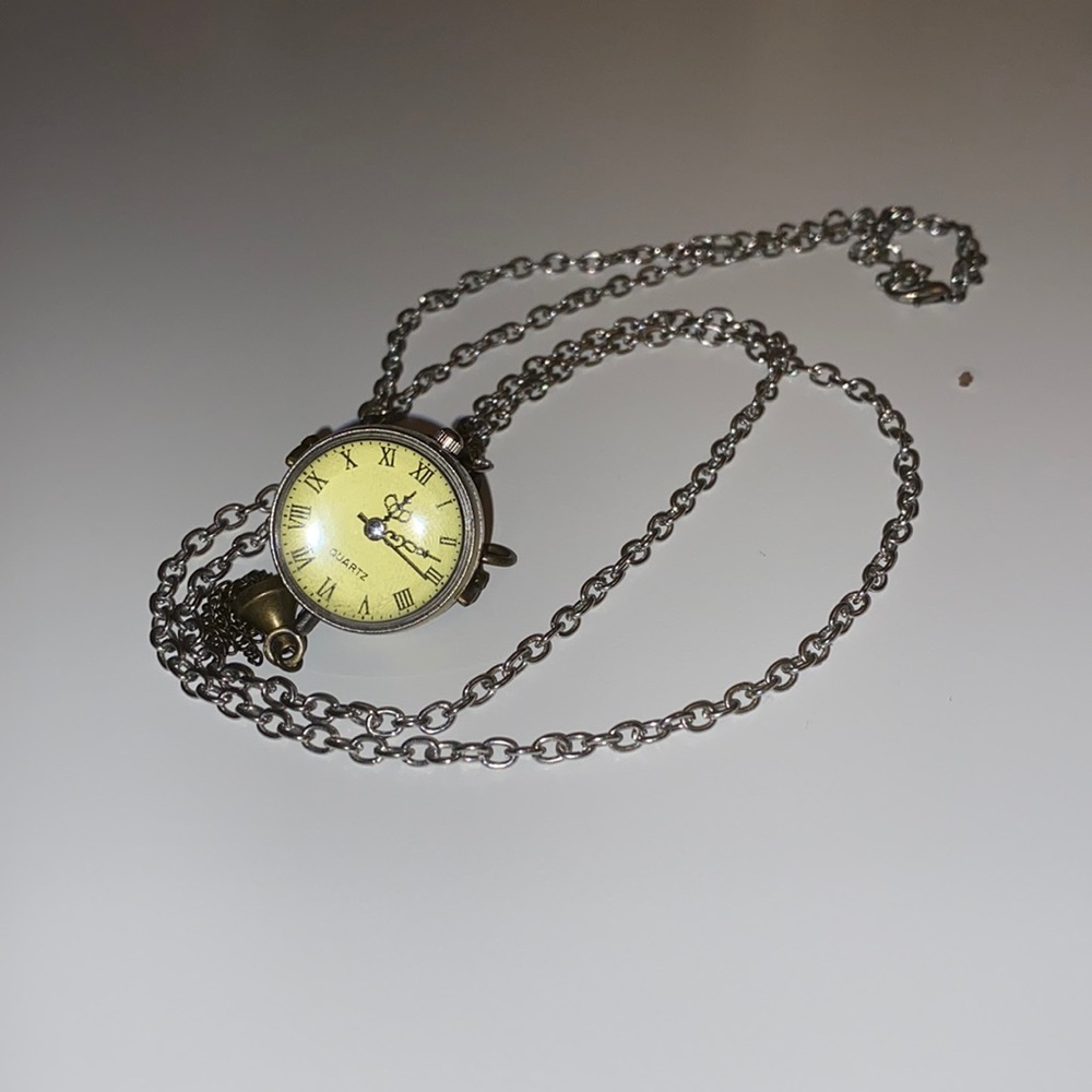 long chained map and clock necklace